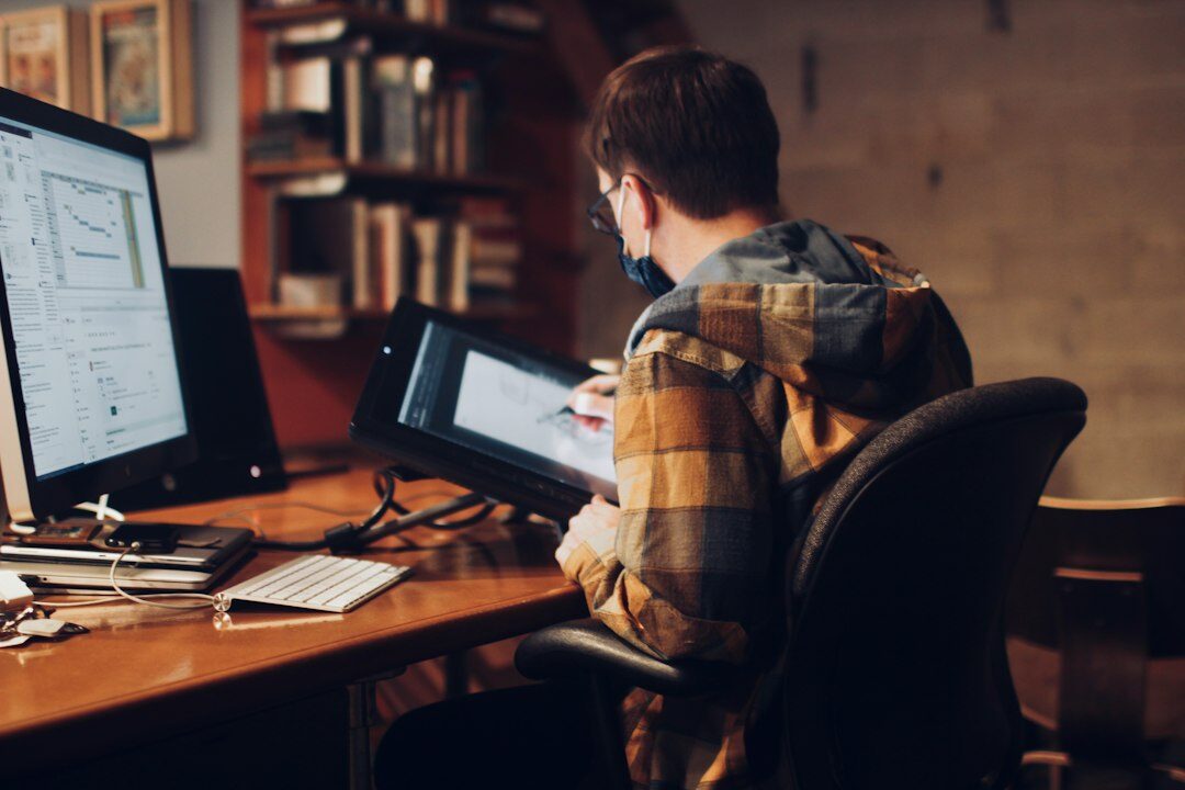programmer coding at desk