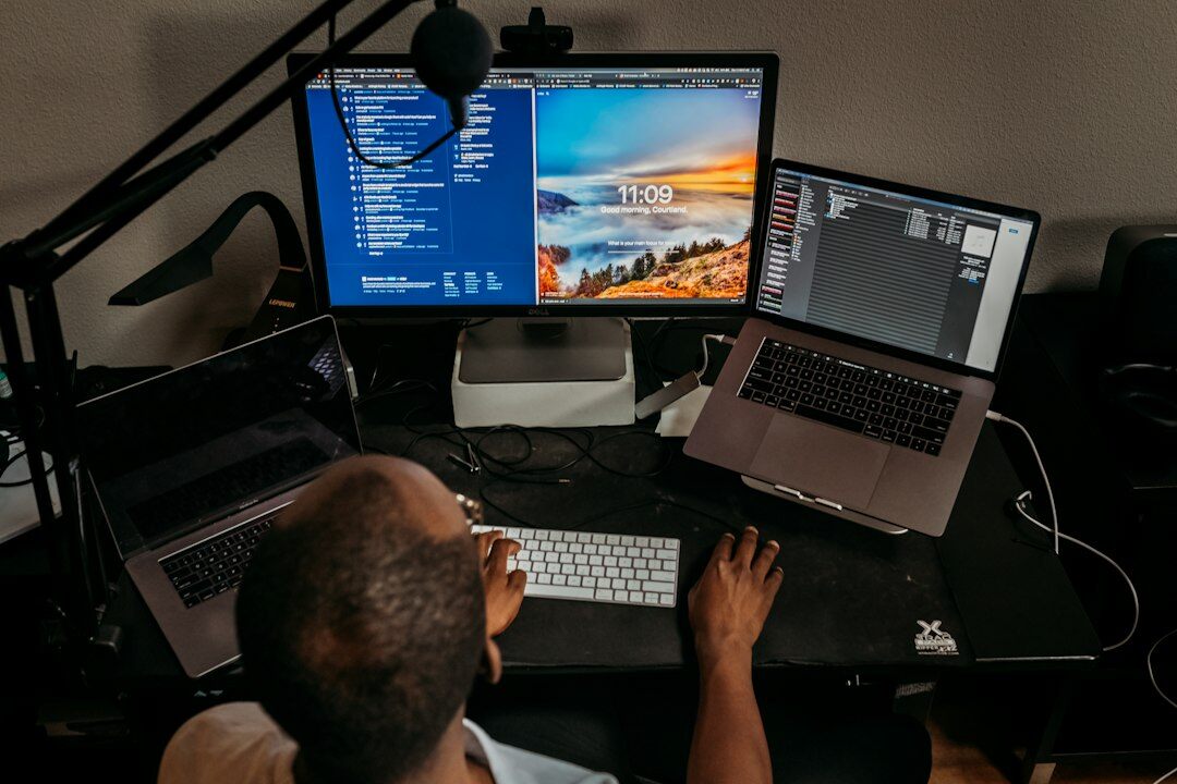 programmer coding at desk